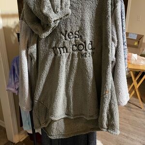 Gray fleece pants and top , large, has graphic on front